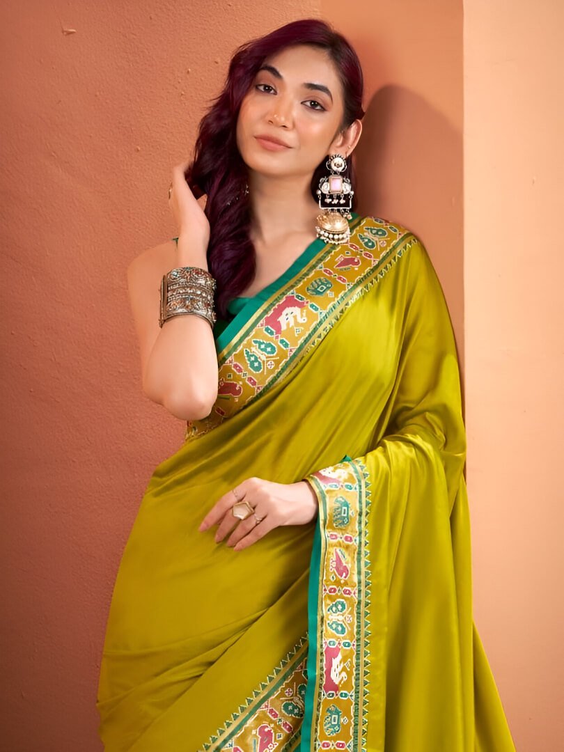 Step Into Elegance with Green Zari Woven Banarasi Patola Silk Saree image 3