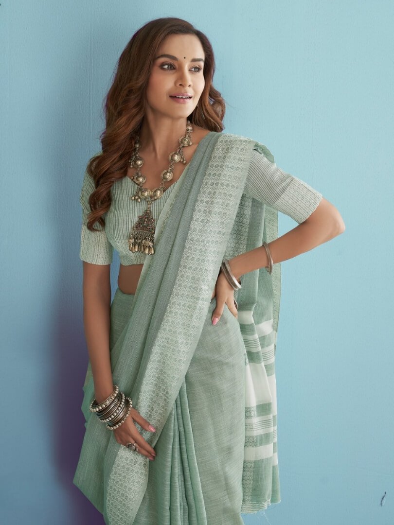 Enhance Your Essence with Mint Green Linen Silk Saree With Chikankari Weaved Border image 3