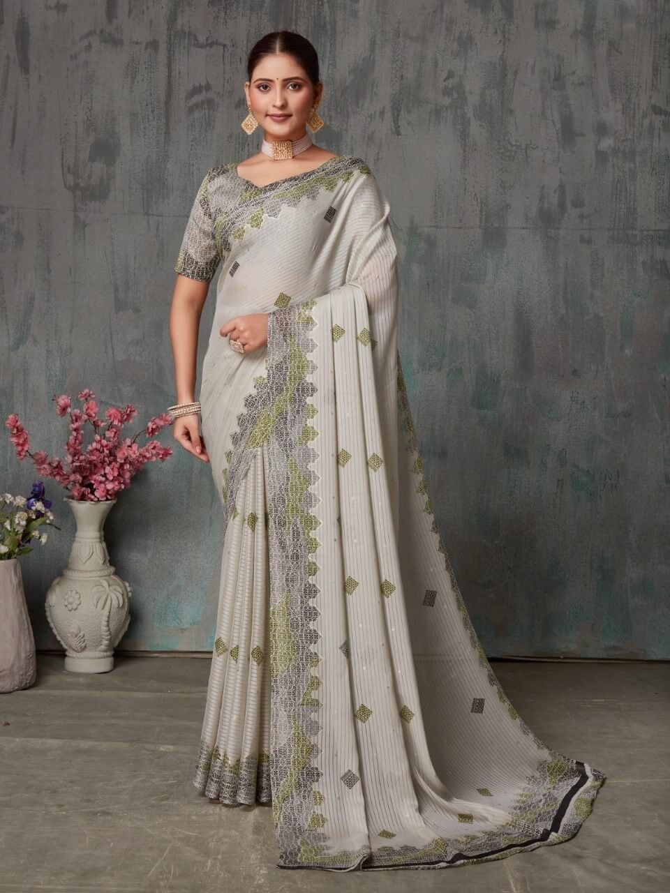 Get Your Glam On with Off White Chiffon Saree With Matching Blouse Piece